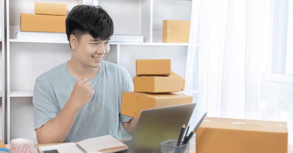 Top Challenges When Dropshipping From China 2 man smiling after receiving first order for dropshipping from china