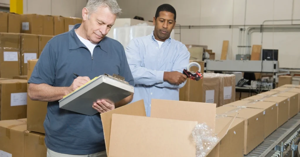 How to Find Reliable Suppliers in China: Complete Beginner’s Guide for 2025 2 Men inspecting goods in distribution warehouse